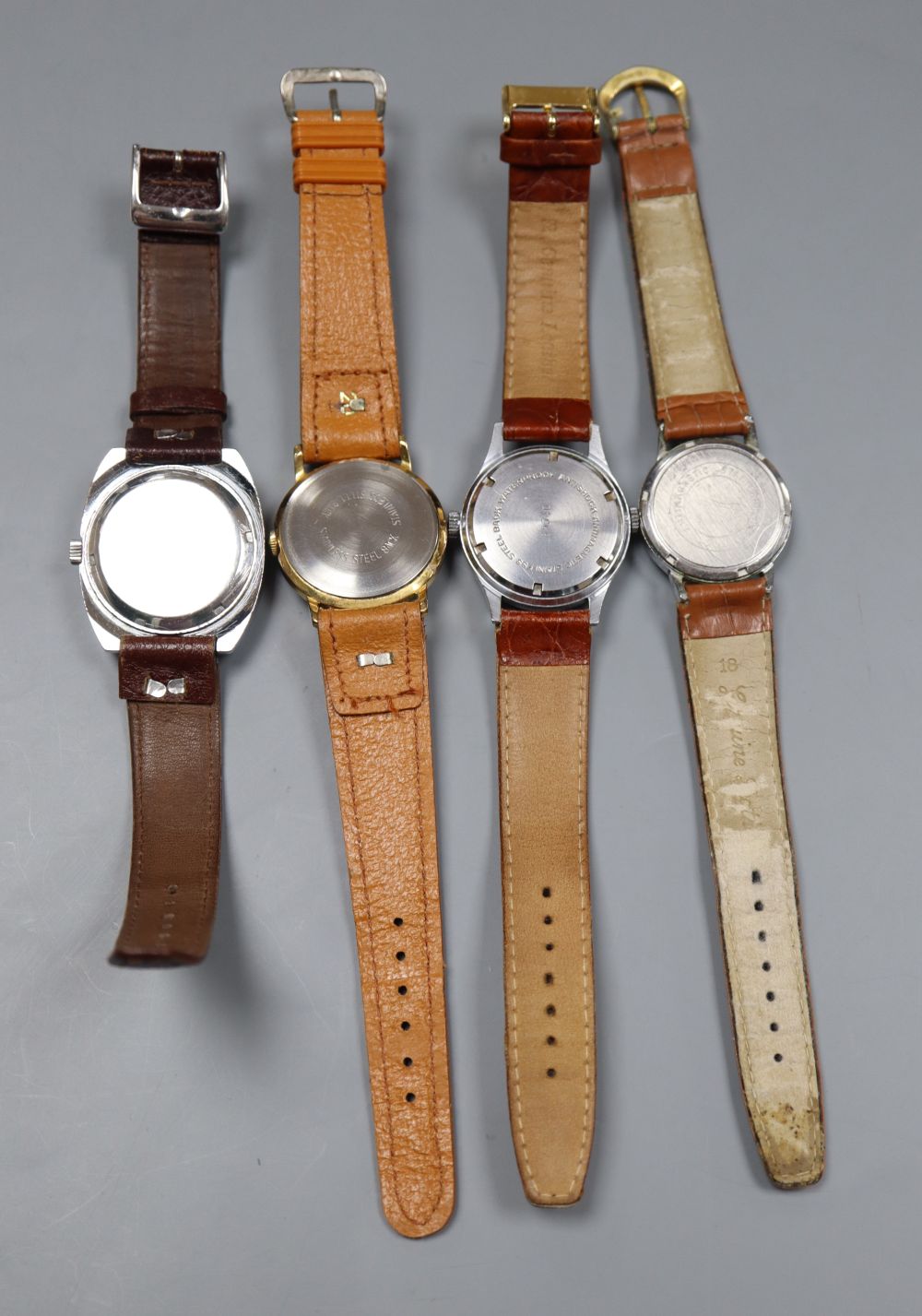 Four assorted wrist watches including Astral, Aurex & Timex.